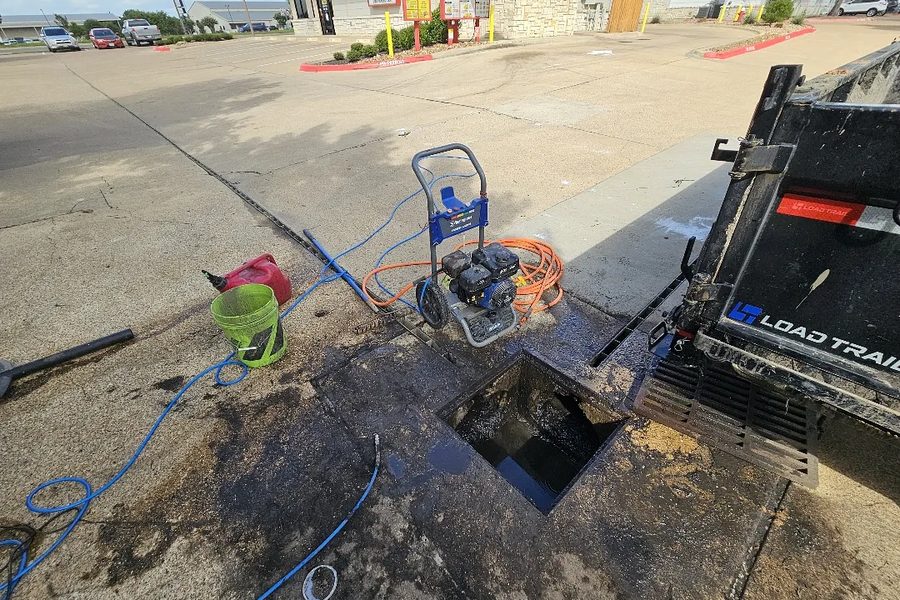 Concrete cut and core drilled in a commercial parking lot for a drain line