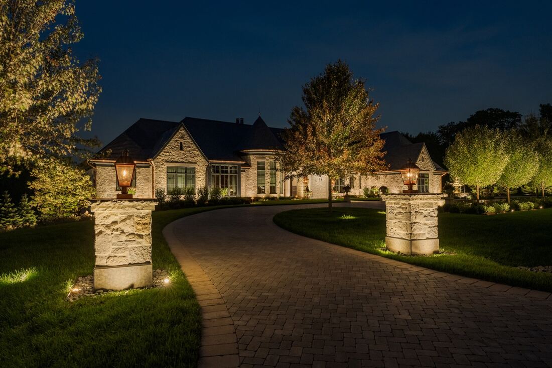 Entry and drive lit for security without floodlight glare